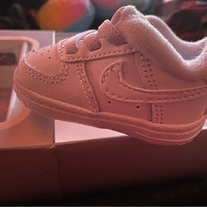 All white Nike shoe size 1c